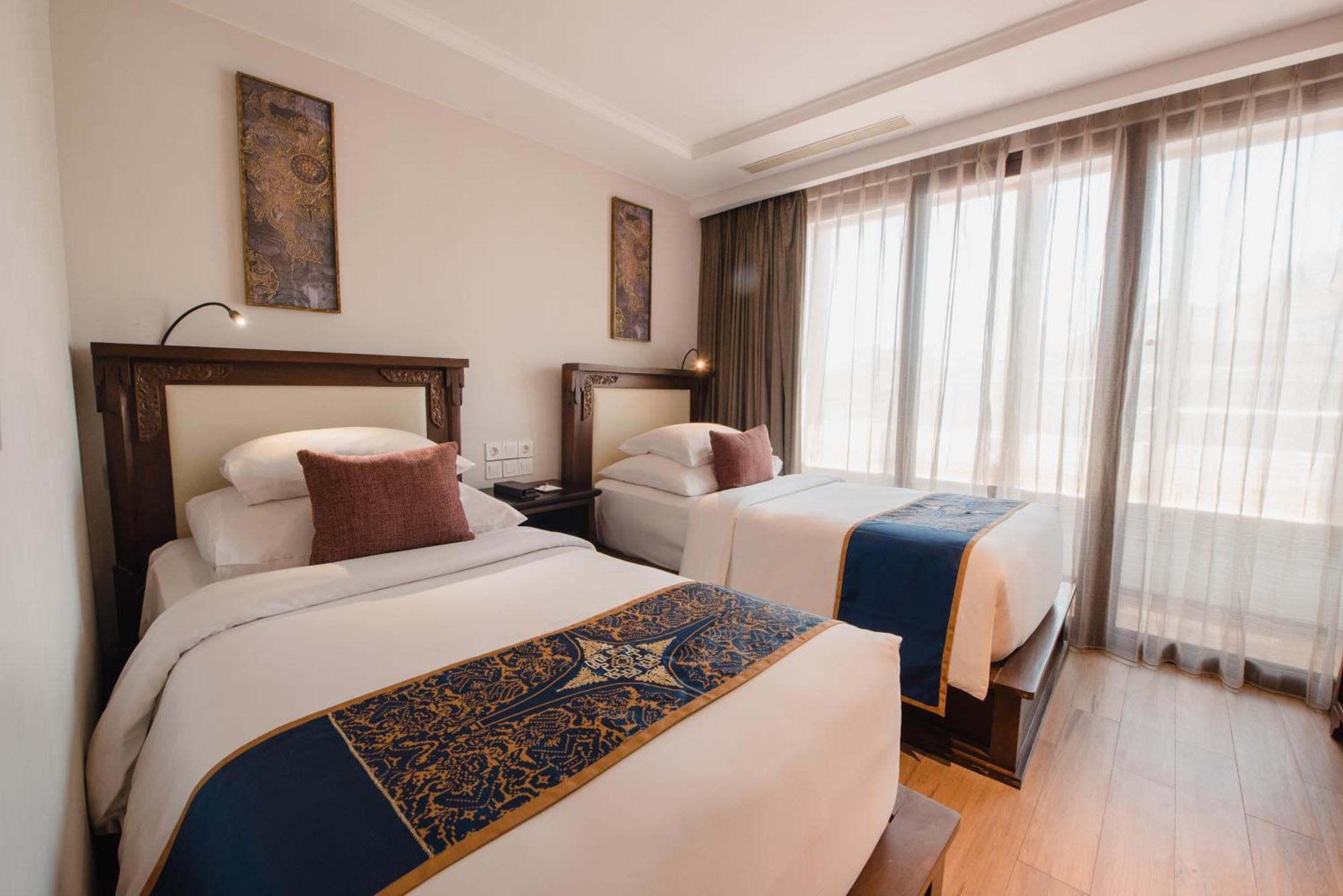 รามายณะ สวีท แอนด์ รีสอร์ต Hotel กูตา ภายนอก รูปภาพ Deluxe Room