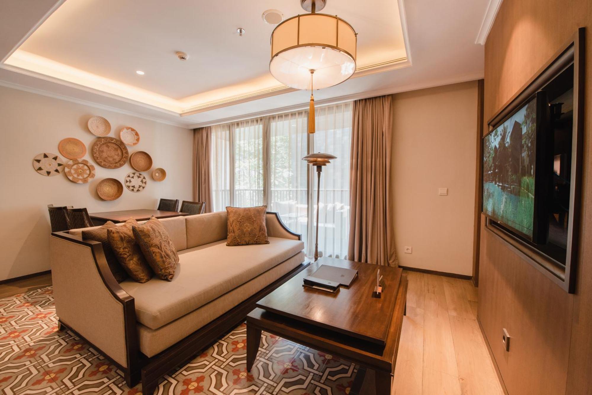 รามายณะ สวีท แอนด์ รีสอร์ต Hotel กูตา ภายนอก รูปภาพ Living room of a suite